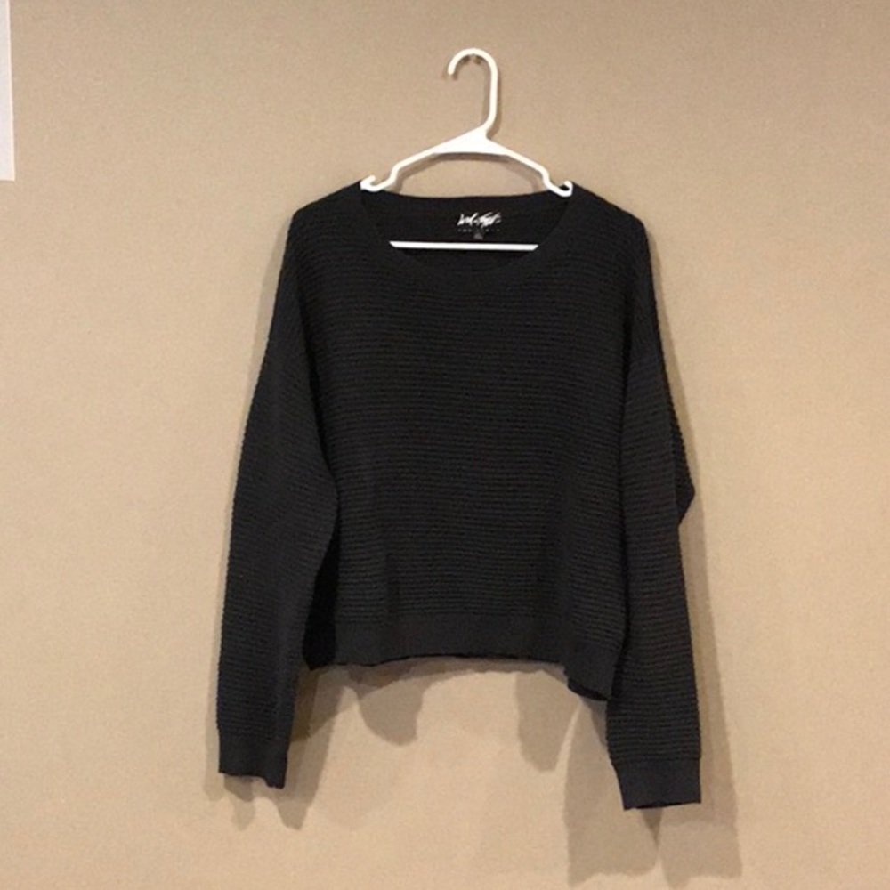 Long sleeved sweater.